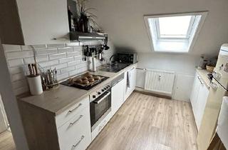 Wohnung kaufen in 64807 Dieburg, Dieburg - Charmante Dachgeschosswohnung mit Balkon in Münster (Hessen)