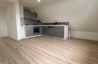 Wohnung kaufen in 77933 Lahr, Lahr (Schwarzwald) - 4-Zimmer-Dachgeschosswohnung mit Klimaanlage