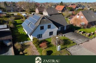 Einfamilienhaus kaufen in 26624 Südbrookmerland, Wohnen, wo die Ruhe zuhause ist – Einfamilienhaus mit Wintergarten in Ostfriesland