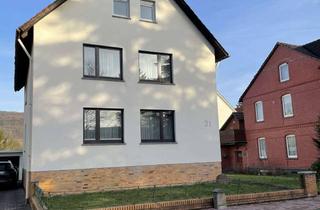 Mehrfamilienhaus kaufen in 31737 Rinteln, Geräumiges Mehrfamilienhaus in Rinteln mit 180 m² Wohnfläche, Garten, Garage uvm