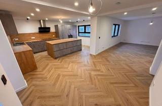 Wohnung mieten in 64569 Nauheim, Erstbezug nach Kernsanierung: Luxuriöse 3,5-Zimmer-Wohnung mit Balkon, Klima, Fußbodenheizung uvm.