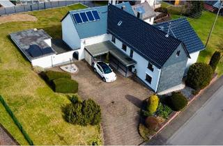 Einfamilienhaus kaufen in 56593 Horhausen, Horhausen (Westerwald) - Einfamilienhaus mit Scheune und Baugrundstück