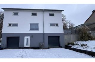 Einfamilienhaus kaufen in 97440 Werneck, Werneck - Modernes, individuell geplantes Einfamilienhaus auf drei Etagen