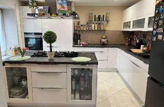 Wohnung kaufen in 71120 Grafenau, Moderne 4-Zimmer-Erdgeschosswohnung mit Terrasse, Garage & Stellplatz in Grafenau-Döffingen