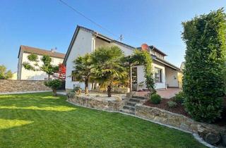 Einfamilienhaus kaufen in 65795 Hattersheim, Modernisiertes Familienhaus mit Sauna und Traumgarten in Hattersheim-Eddersheim