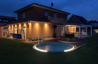 Villa kaufen in 38448 Brackstedt, Mediterrane Stadtvilla mit Rundpool & Luxus-Whirlpool: Wohnen, wo Qualität und Freizeit zuhause sind