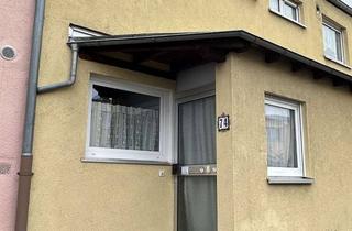 Haus kaufen in 60488 Praunheim, Ernst-May Reihenmittelhaus mit Wintergarten und Garten in Praunheim