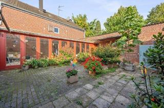 Doppelhaushälfte kaufen in 41352 Korschenbroich, Korschenbroich - Modernisierte Doppelhaushälfte mit Wintergarten & XL-Garten