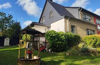 Doppelhaushälfte kaufen in 14827 Wiesenburg, Wiesenburg/Mark - Doppelhaushälfte auf idyllischem Grundstück mit Potential