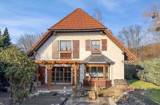 Einfamilienhaus kaufen in 31848 Bad Münder, Bad Münder - Wohnen mit Perspektive, Wintergarten und Doppelgarage!