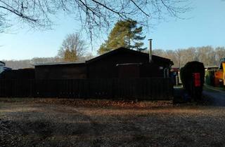Haus kaufen in 46509 Xanten, Xanten - Doppelpachtgrundstück mit 2 Holzhäusern mitten im Wald, Xanten