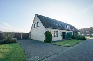 Haus kaufen in 47551 Bedburg-Hau, Bedburg-Hau: Zweifamilienhaus mit viel Potential und Bauland