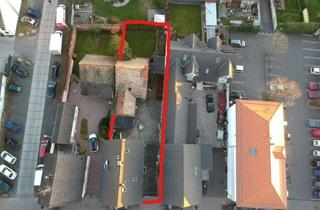 Mehrfamilienhaus kaufen in 65479 Raunheim, Gepflegtes Mehrfamilienhaus mit integrierter Gewerbefläche und weiterem Entwicklungspotenzial