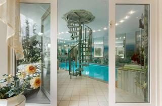 Villa kaufen in 30938 Burgwedel, Edle Familien-Villa auf diskretem Traumgrundstück mit Indoor-Pool in Top-Lage von Großburgwedel
