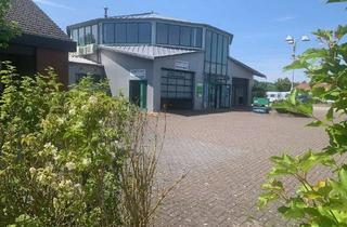 Gewerbeimmobilie kaufen in 31535 Neustadt, Vermietet Büroeinheiten mit Fahrzeughallen und einer Büro-Freifläche zur Eigennutzung