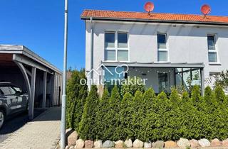 Haus mieten in 23758 Oldenburg, Moderne KfW-Doppelhaushälfte im Neubaugebiet - Wärmepumpe, Wallbox & Wintergarten