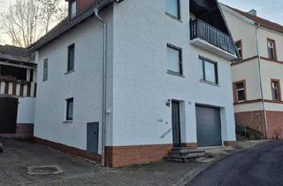 Einfamilienhaus kaufen in 97725 Elfershausen, Elfershausen - Zwei- bzw. Einfamilienhaus mit integrierte Garage