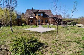 Haus kaufen in 18258 Schwaan, Schwaan - Erdwärmepumpe Blockbohlenhaus m. weiterem Bauplatz Provisionsfrei