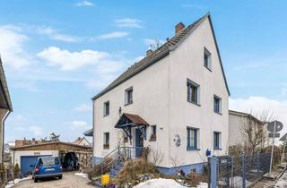 Einfamilienhaus kaufen in 35398 Gießen, Charmantes Einfamilienhaus mit idyllischem Garten