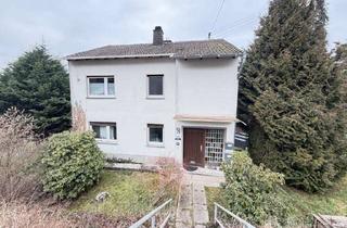 Haus kaufen in 55765 Birkenfeld, Gemütliches Zweifamilienhaus mit Terrasse, Balkon und Vermietungspotenzial