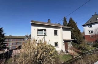 Haus kaufen in 55765 Birkenfeld, Gemütliches Zweifamilienhaus mit Terrasse, Balkon und Vermietungspotenzial