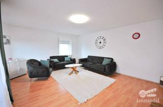 Wohnung kaufen in 65479 Raunheim, Vermietete 2,5 Zimmer mit Terrasse und Garage in einem kleinen Mehrfamilienhaus