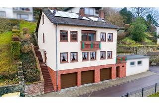 Einfamilienhaus kaufen in 54655 Kyllburg, Gemütliches Einfamilienhaus mit Einliegerwohnung, 3 Garagen und moderner Energietechnik