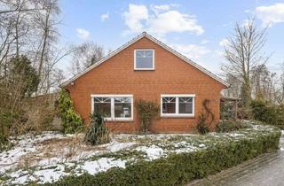 Einfamilienhaus kaufen in 26624 Südbrookmerland, Wohnen im Grünen – Charmantes, energetisch saniertes Einfamilienhaus auf großem Naturgrundstück