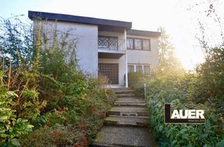 Haus kaufen in 66787 Wadgassen, Freistehendes Zweifamilienhaus mit Einliegerwohnung, Garten und Doppelgarage zu verkaufen.