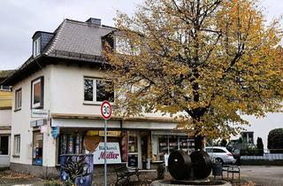 Haus kaufen in 61440 Oberursel, Oberursel-Oberstedten: WGH mit einer bezugsfertigen Top-WE und einem vermieteten Ladengeschäft