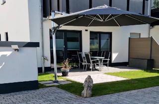 Wohnung kaufen in 61250 Usingen, Usingen - Modernes WOHNGLÜCK Gemutliche Wohnung mit Terasse und Garten