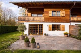 Wohnung kaufen in 83700 Rottach-Egern, Ruhige und sonnige Gartenwohnung mit Kachelofen und Süd-Westgarten