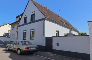 Einfamilienhaus kaufen in 67065 Mundenheim, Attraktives Mehr- oder Einfamilienhaus mit 4 Einheiten, Garten und flexiblen Nutzungsmöglichkeiten
