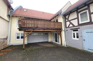 Haus kaufen in 35452 Heuchelheim, 2 Wohnhäuser (Neubau und Fachwerkhaus) in Heuchelheim-OT mit großem Grundstück