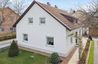 Einfamilienhaus kaufen in 94486 Osterhofen, Einfamilienhaus mit Dachterrasse, Garten und Doppelgarage in ruhiger Dorfrandlage!