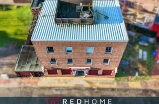 Anlageobjekt in 25541 Brunsbüttel, Investitionschance: Gewerbeobjekt mit Zimmervermietungs-Potenzial und Halle