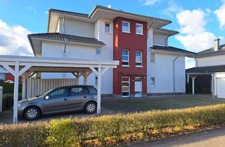 Wohnung kaufen in 49170 Hagen, Gepflegte Eigentumswohnung mit Carport-Stellplatz in Hagen a.T.W.