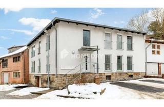 Haus kaufen in 37581 Bad Gandersheim, Charmantes 4-Familienhaus in ruhiger Hanglage – Solide Kapitalanlage mit 4 Garagen & 2 Stellplätzen