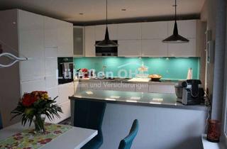 Wohnung kaufen in 27607 Langen, Geestland - Modernisierte Eigentumswohnung mit Balkon