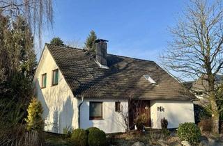 Haus kaufen in 25746 Heide, Exklusives Wohnen in Sackgassenlage: Gepflegtes Haus mit Galerie, Kamin und Garten in Heide-Ost