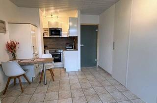 Haus kaufen in 41469 Neuss, Reihenmittelhaus mit Einliegerwohnung und Blick auf den Nierspark