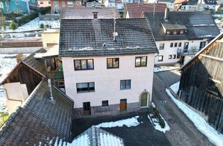Haus kaufen in 97816 Lohr, Großzügiges Zweifamilienhaus mit zwei Wohneinheiten, Balkon und Nebengebäude im Spessart