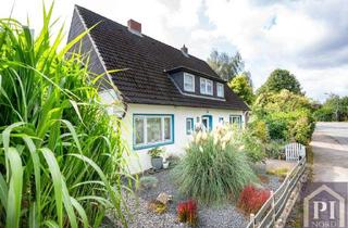 Haus kaufen in 24248 Mönkeberg, Flexibles Wohn- und Investitionsobjekt mit 4 Wohnungen und Baulandoption