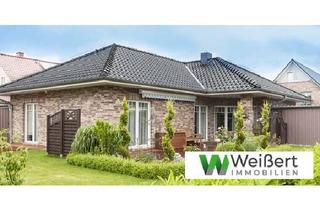 Haus kaufen in 24628 Hartenholm, Komfort auf einer Ebene - 3-Zimmer-WinkelbungalowNiedrigenergiehaus EH 40 mit Wärmepumpe und PV –