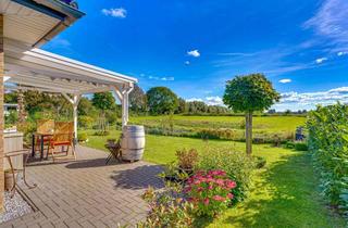 Anlageobjekt in 24882 Schaalby, Kapitalanlage o. Zuhause: Doppelhaus mit 2 WE, Erdwärme, Garten & traumhaftem Blick über die Felder!