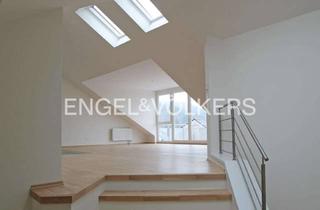 Wohnung kaufen in 69221 Dossenheim, Moderne Dachgeschosswohnung mit offener Wohnküche und Südbalkon