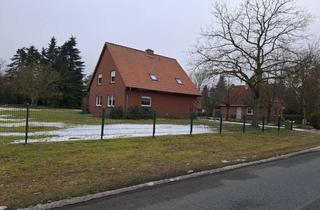 Haus kaufen in Deblinghausen, 31595 Steyerberg, Stilvolles Zweifamilienhaus mit großem Garten, Terrasse, Garage und CarportWohnen mit Raum für Leb