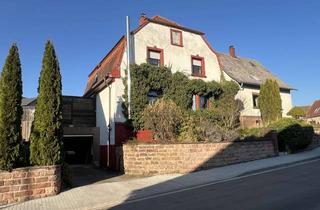 Einfamilienhaus kaufen in 67716 Heltersberg, Charmantes Einfamilienhaus mit Garage und einladender Terrasse