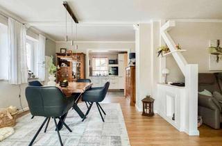 Anlageobjekt in 94550 Künzing, Sommer im Garten, Winter um den Ofen: modernes Familienhaus mit Terrasse, Balkon & Garage