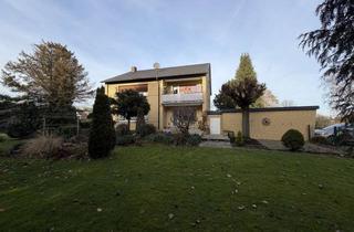 Haus kaufen in 59069 Rhynern, Solide Kapitalanlage: Gepflegtes Zweifamilienhaus mit Terrasse, Balkonen & Garten